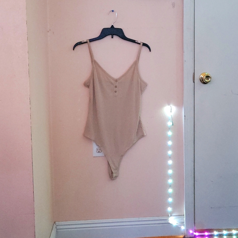 Tan body suit